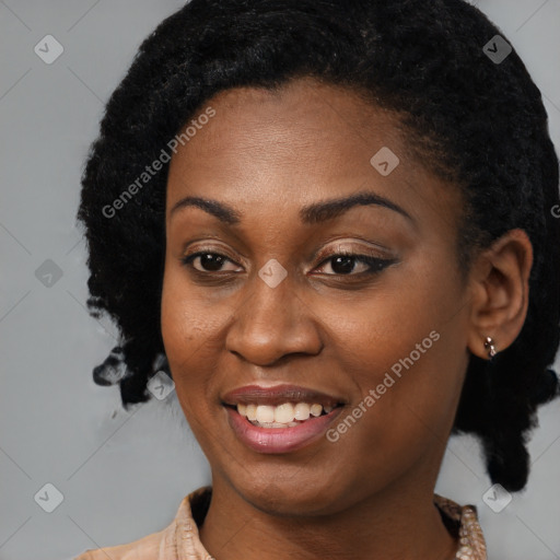 Joyful black young-adult female with medium  black hair and brown eyes