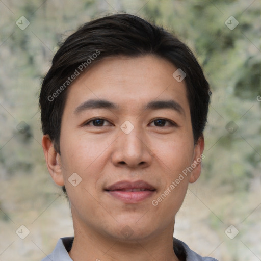 Joyful asian young-adult male with short  black hair and brown eyes