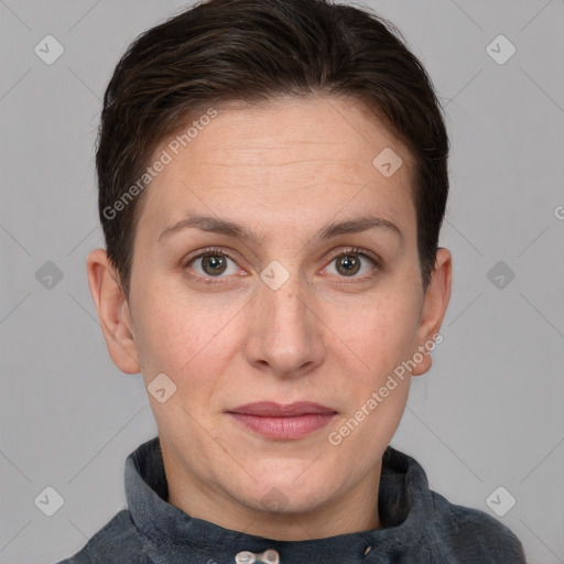 Joyful white adult female with short  brown hair and brown eyes