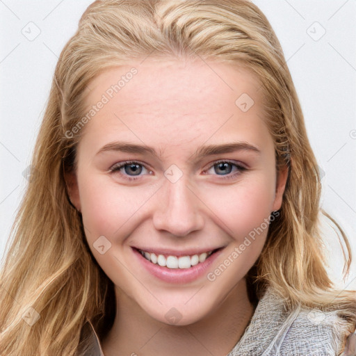 Joyful white young-adult female with long  brown hair and blue eyes