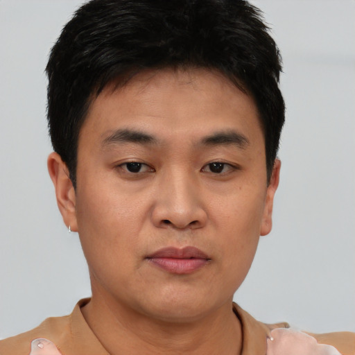 Neutral asian young-adult male with short  black hair and brown eyes