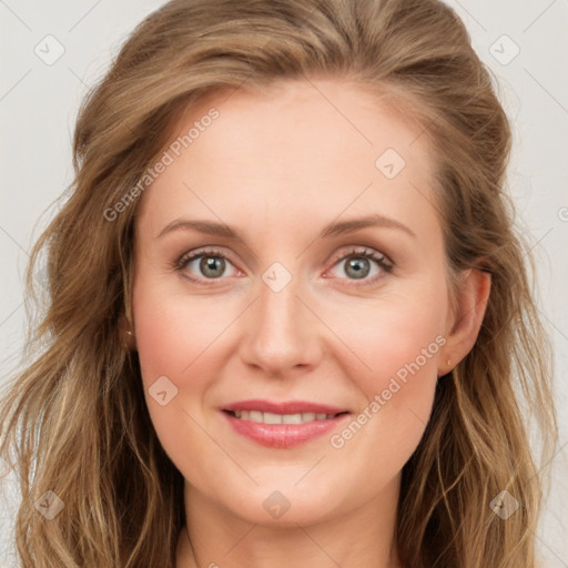 Joyful white young-adult female with long  brown hair and blue eyes