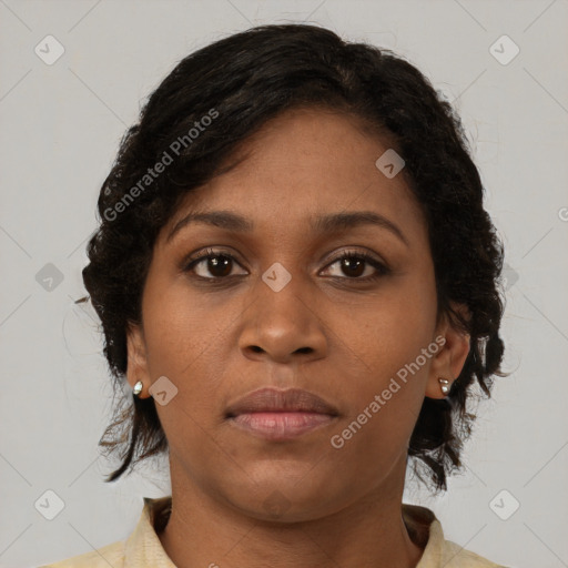 Neutral black young-adult female with medium  brown hair and brown eyes