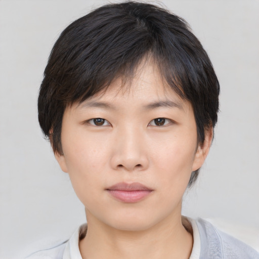 Neutral asian young-adult female with medium  brown hair and brown eyes