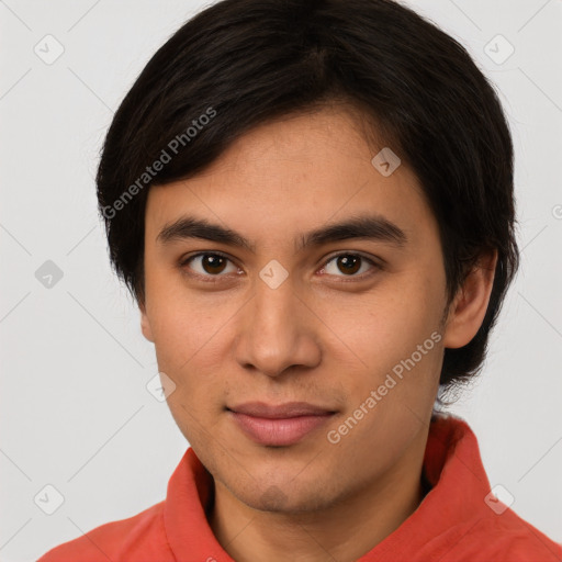 Joyful latino young-adult male with short  brown hair and brown eyes