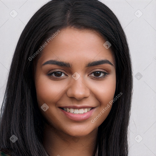 Joyful latino young-adult female with long  brown hair and brown eyes