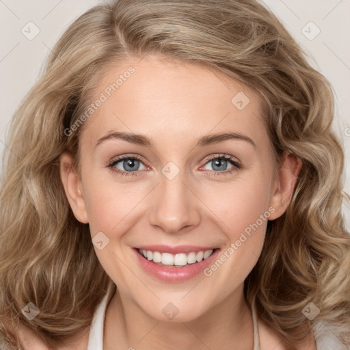 Joyful white young-adult female with medium  brown hair and blue eyes