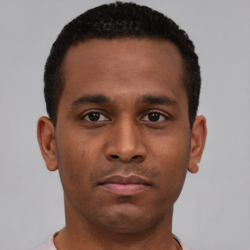 Neutral black young-adult male with short  brown hair and brown eyes