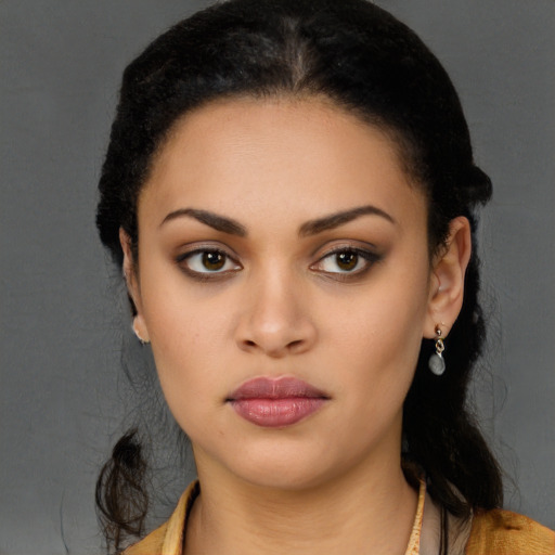 Neutral latino young-adult female with long  black hair and brown eyes