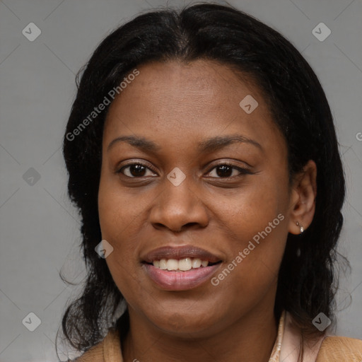 Joyful black young-adult female with medium  brown hair and brown eyes