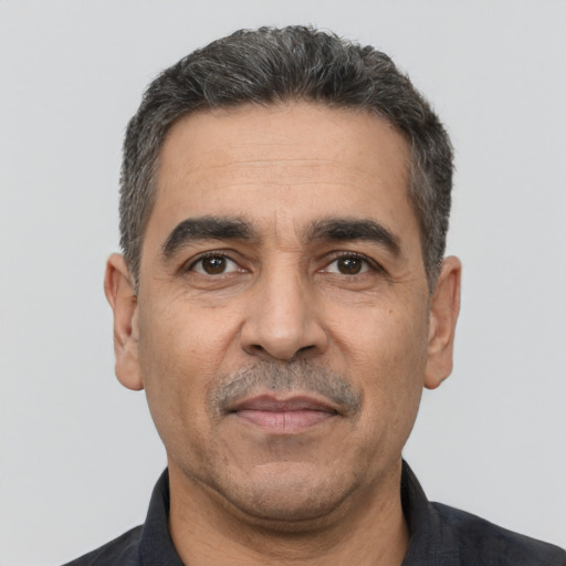 Neutral white adult male with short  black hair and brown eyes