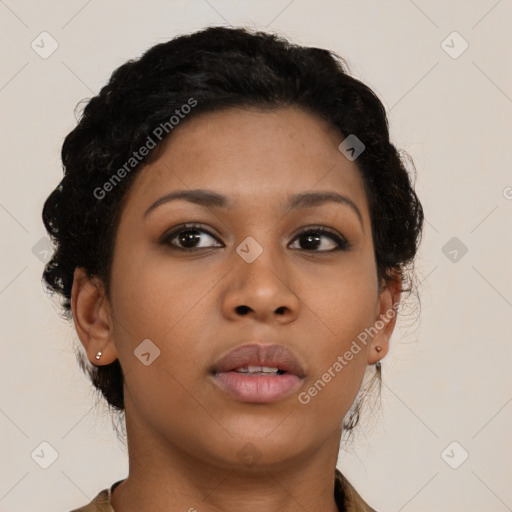 Neutral black young-adult female with medium  brown hair and brown eyes