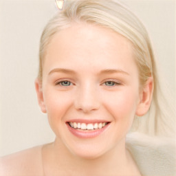 Joyful white young-adult female with medium  brown hair and blue eyes