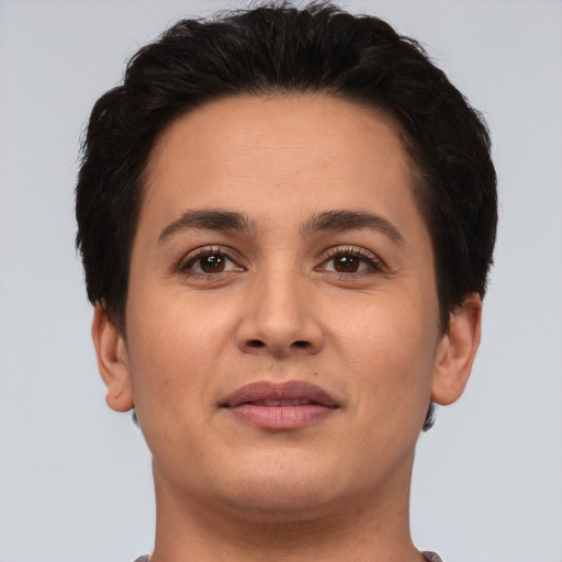 Joyful white young-adult female with short  brown hair and brown eyes