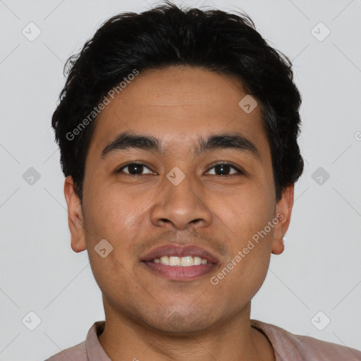 Joyful latino young-adult male with short  brown hair and brown eyes