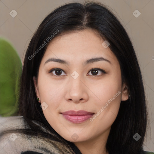 Joyful asian young-adult female with long  brown hair and brown eyes