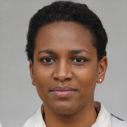 Neutral black young-adult female with short  black hair and brown eyes