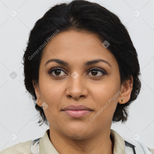 Joyful latino young-adult female with medium  brown hair and brown eyes