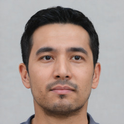 Neutral asian young-adult male with short  black hair and brown eyes