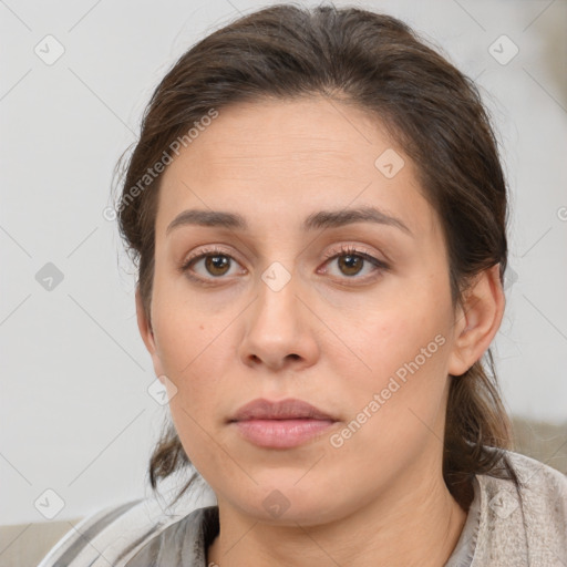 Neutral white young-adult female with medium  brown hair and brown eyes