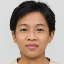 Joyful asian young-adult female with short  brown hair and brown eyes