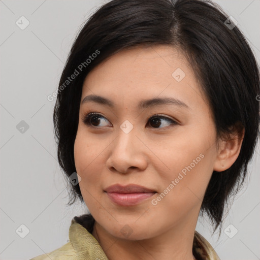 Joyful asian young-adult female with medium  brown hair and brown eyes