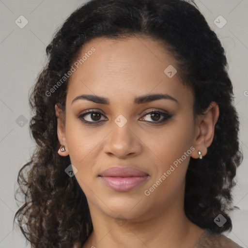 Joyful black young-adult female with long  brown hair and brown eyes