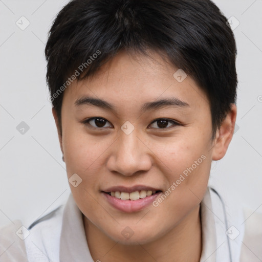 Joyful asian young-adult female with short  brown hair and brown eyes