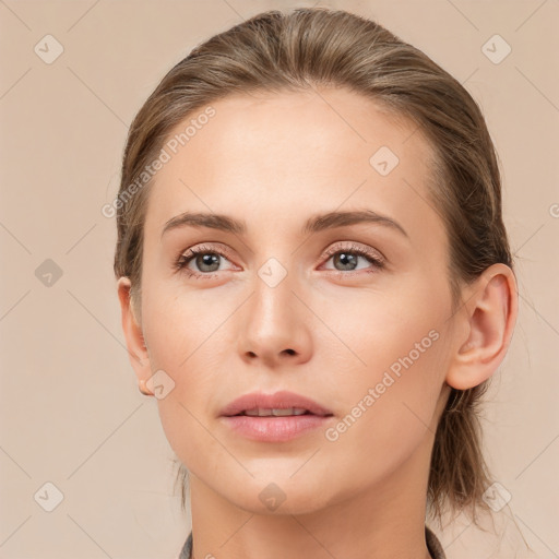 Neutral white young-adult female with medium  brown hair and brown eyes