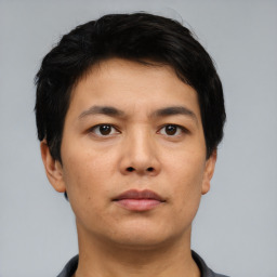 Neutral asian young-adult male with short  black hair and brown eyes