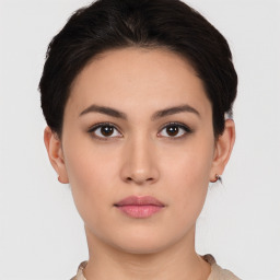 Neutral white young-adult female with short  brown hair and brown eyes