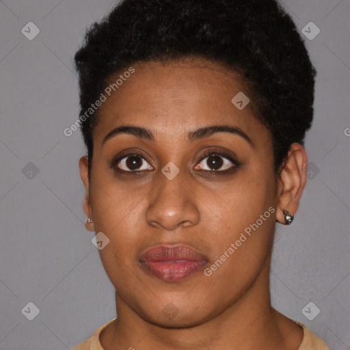 Joyful black young-adult female with short  brown hair and brown eyes