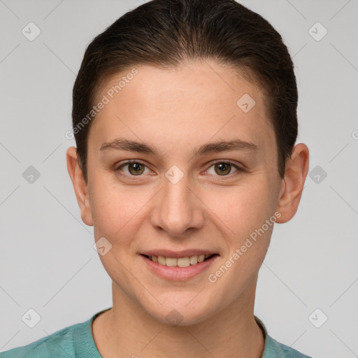 Joyful white young-adult female with short  brown hair and brown eyes