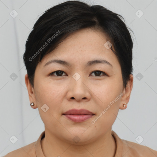 Joyful asian young-adult female with short  brown hair and brown eyes