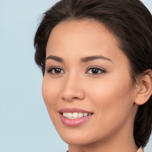 Joyful white young-adult female with medium  brown hair and brown eyes