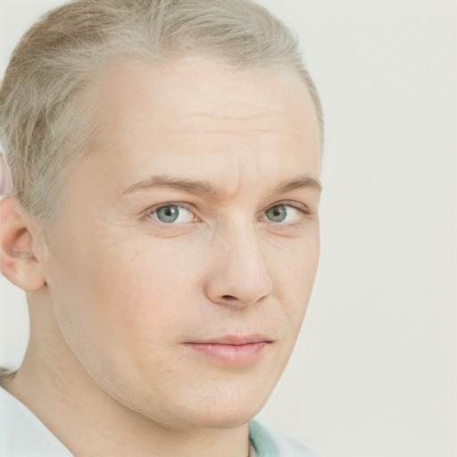 Neutral white young-adult male with short  blond hair and blue eyes