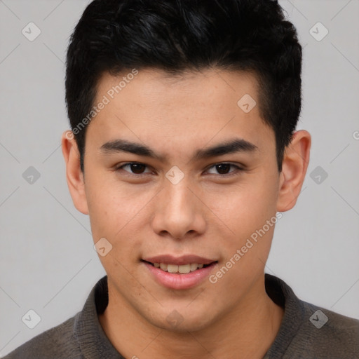 Joyful asian young-adult male with short  brown hair and brown eyes