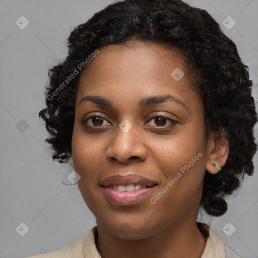 Joyful black young-adult female with medium  black hair and brown eyes