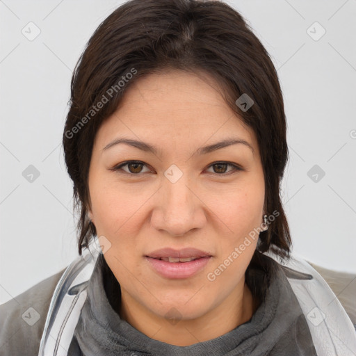 Joyful white adult female with medium  brown hair and brown eyes