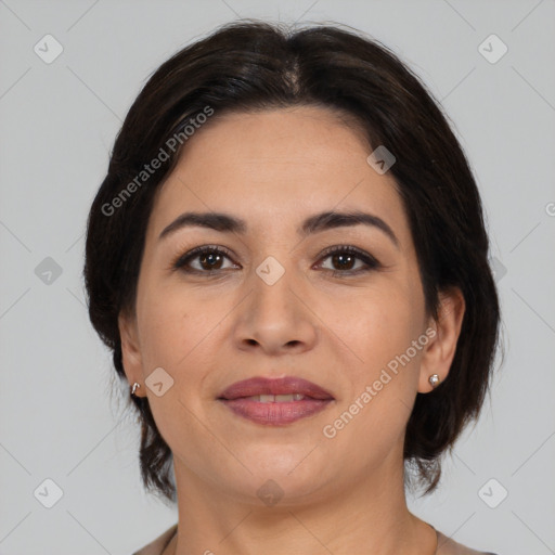 Joyful latino young-adult female with medium  brown hair and brown eyes