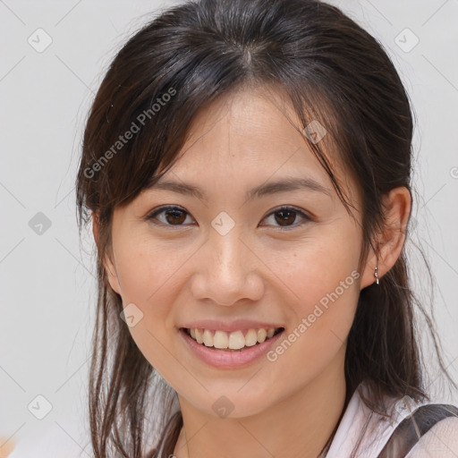 Joyful white young-adult female with medium  brown hair and brown eyes