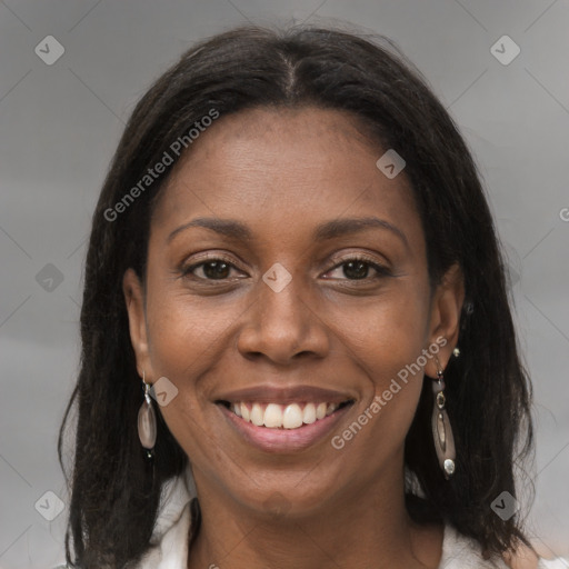 Joyful black young-adult female with medium  brown hair and brown eyes