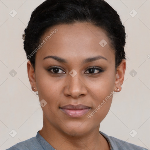 Joyful black young-adult female with short  brown hair and brown eyes