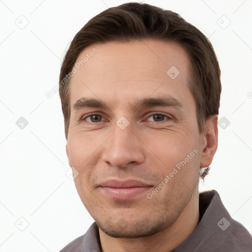 Joyful white young-adult male with short  brown hair and brown eyes