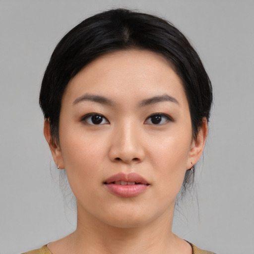 Neutral asian young-adult female with medium  black hair and brown eyes