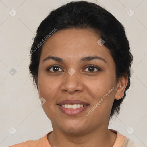 Joyful latino young-adult female with short  brown hair and brown eyes