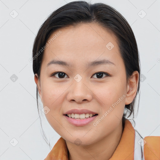 Joyful asian young-adult female with long  brown hair and brown eyes