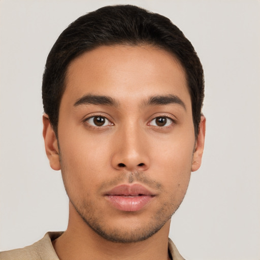 Neutral latino young-adult male with short  brown hair and brown eyes