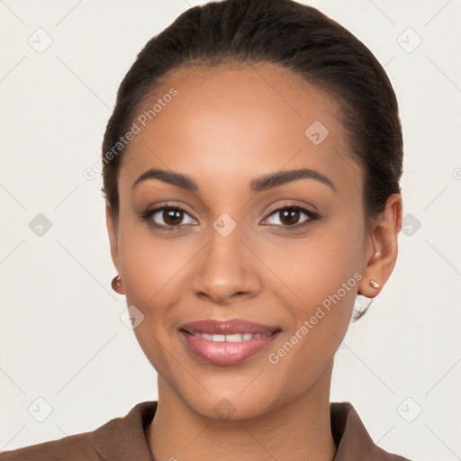 Joyful latino young-adult female with long  brown hair and brown eyes