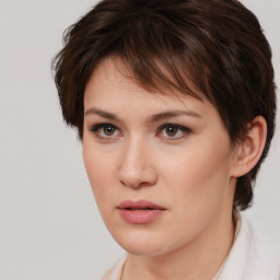 Neutral white young-adult female with short  brown hair and brown eyes